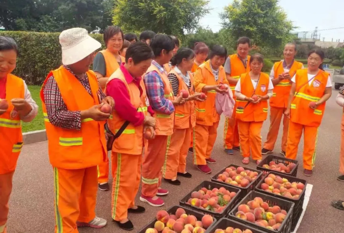 韩城：80后创业青年爱心助力城市环卫工作（图）